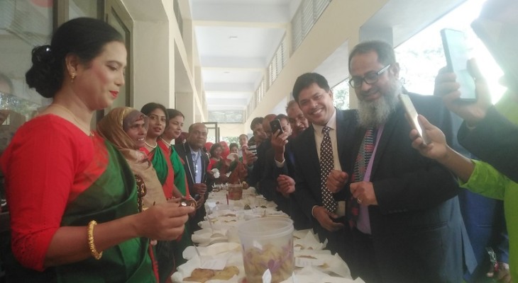 সাপাহারে ন্যাশনাল লাইফ ইনস্যুরেন্স জনবীমী'র পিঠা ও আনন্দ উৎসব